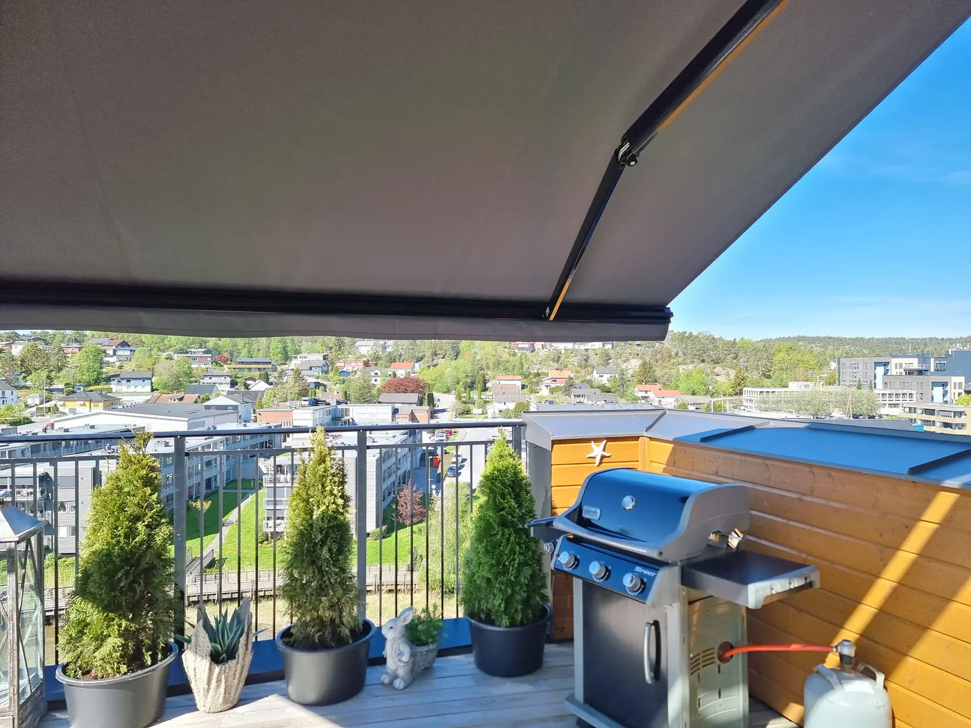 Terrassemarkise fra REX over uteplass ved bolig